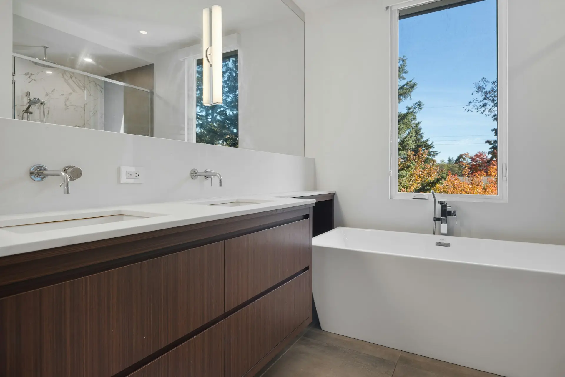 a bathroom with a tub and sink