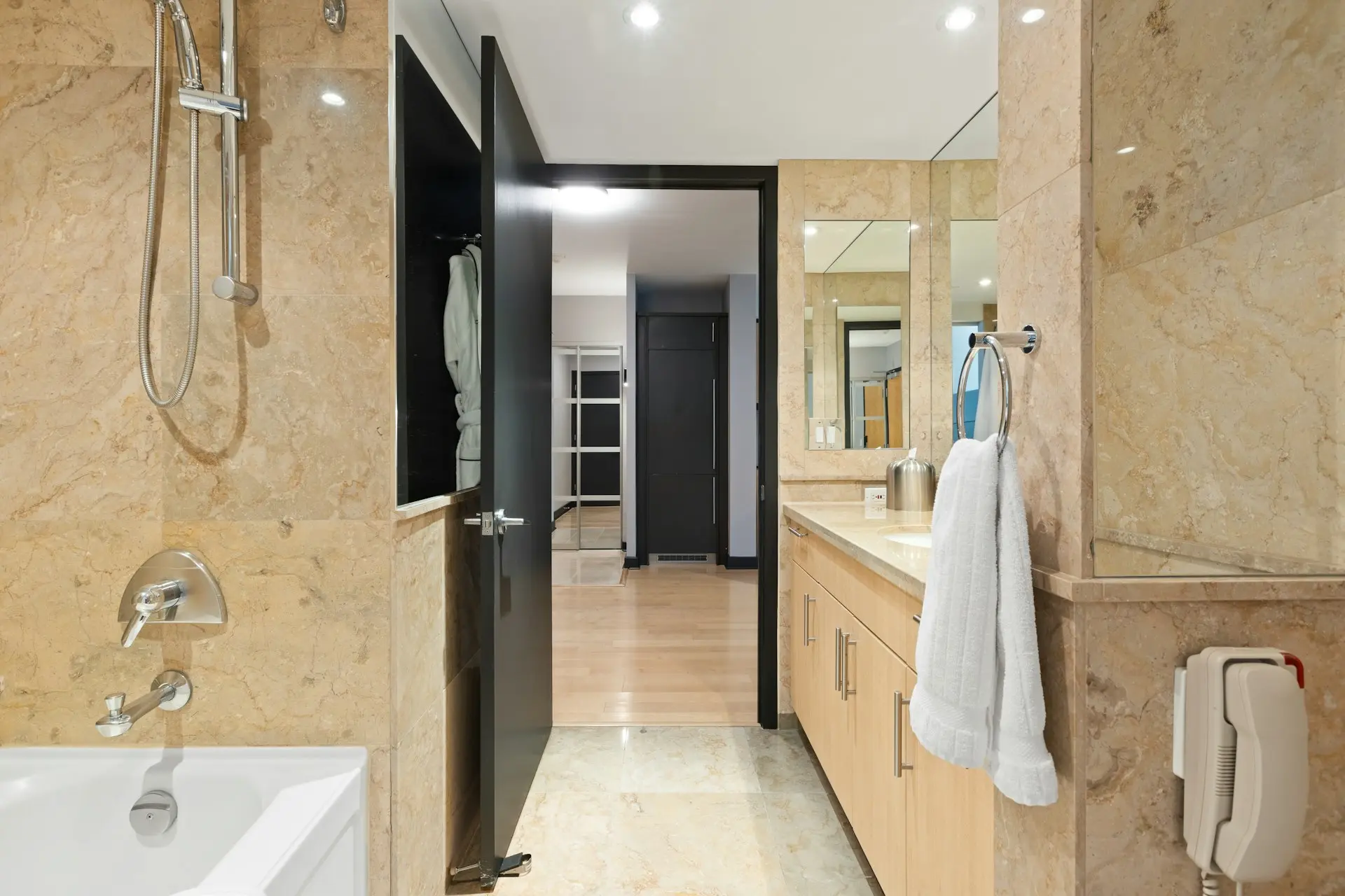 white towel hanged on brown wooden door